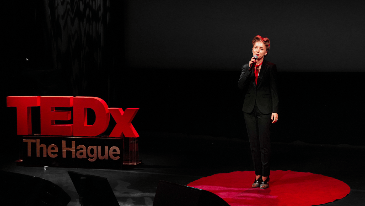TEDx Speaker on stage
